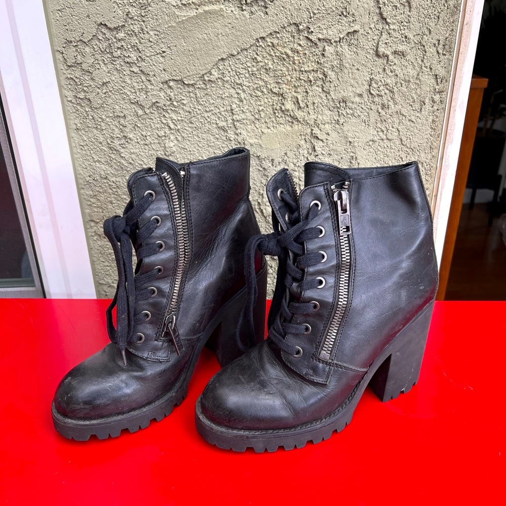 Lace up rubber lug sole booties. Perfect for all seasons